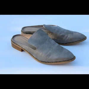 Very volatile studded flat mules
